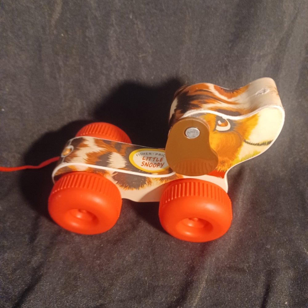 Toy, fisher Price little snoopy dog. Rolls on wheels